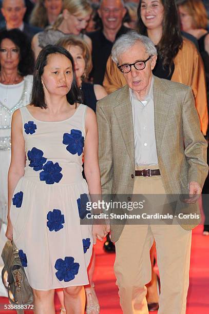 Director Woody Allen and wife Soon-Yi Previn attend the 'Blue Jasmine' Paris premiere at UGC Cine Cite Bercy on August 27, 2013 in Paris