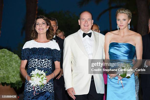 Princesse Caroline of Hanover, Prince Albert II of Monaco and Princesse Charlene of Monaco attend the 65th Monaco Red Cross Ball Gala at Sporting...