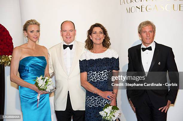 Princess Charlene of Monaco, Prince Albert II of Monaco, Princess Caroline of Hanover and Michael Bolton attend the 65th Monaco Red Cross Ball Gala...