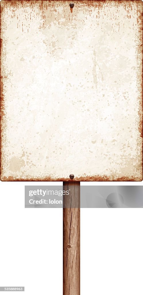 Weathered blank placard with wooden post isolated on white