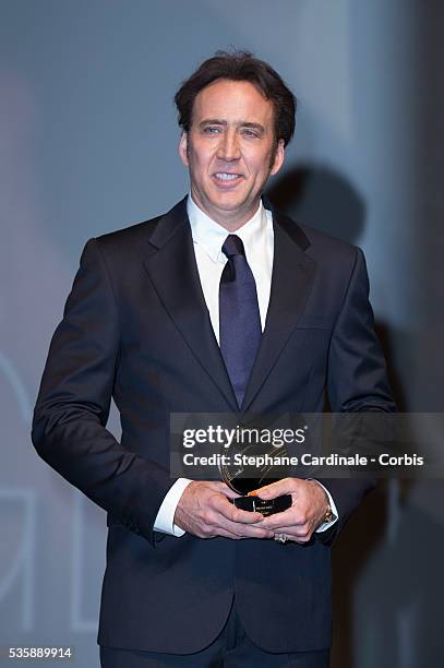 Nicolas Cage receives a tribute before to attend the screening of the movie 'Joe' during the 39th Deauville American Film Festival, in Deauville.