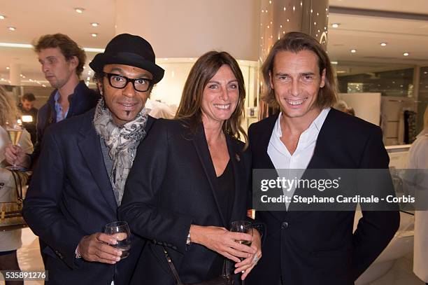 Manu Katche , Laurence Katche and Frederic Torloting attend the Vendanges Montaigne 2013 at Courreges, in Paris.