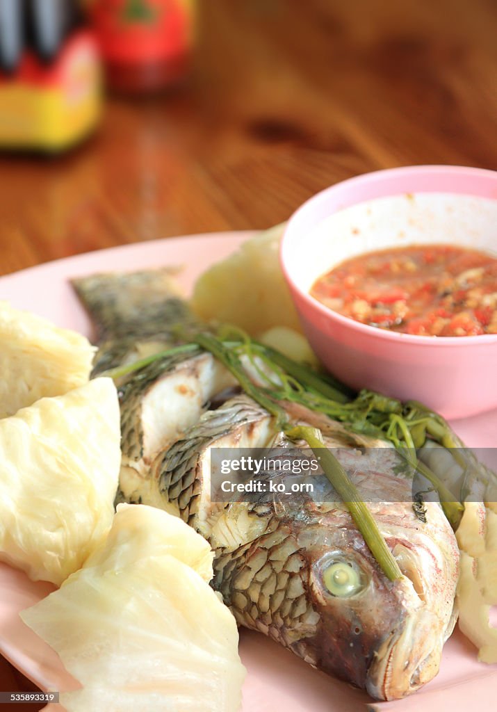 Steamed fish with vegetable.