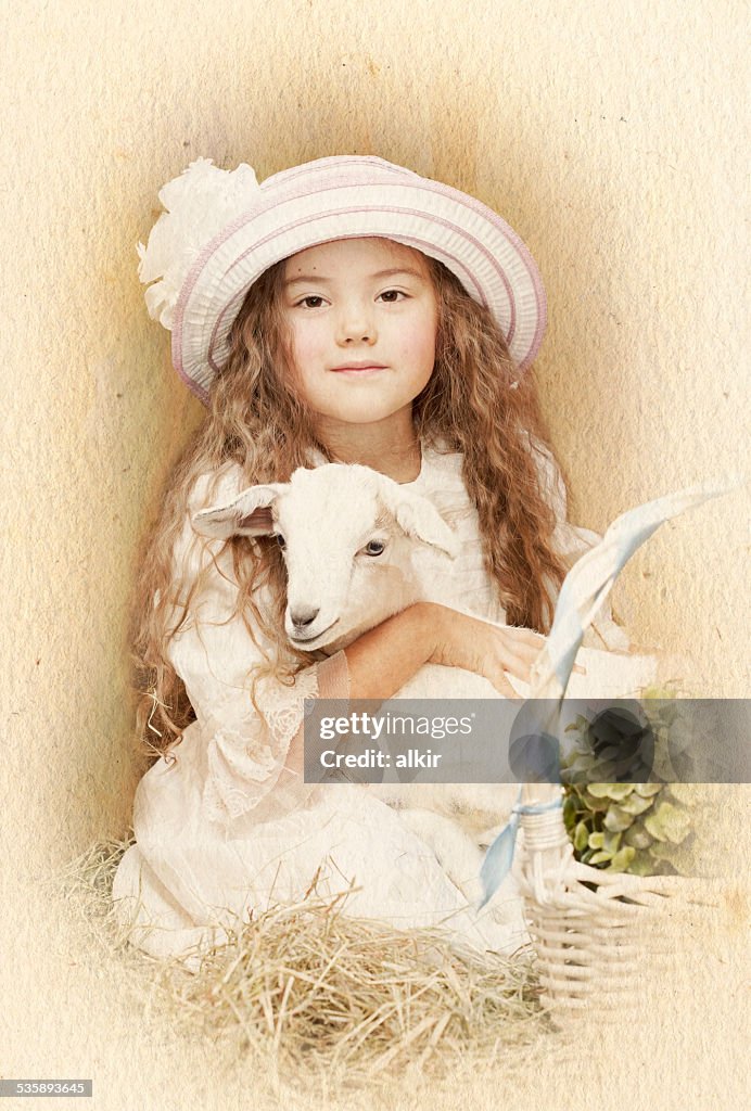 Child posing with her pet goat