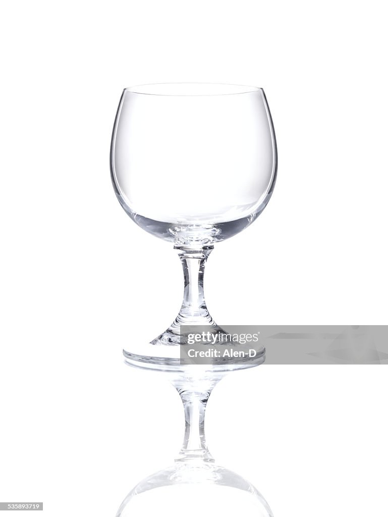 Wineglass over white background, cut out empty glass beaker