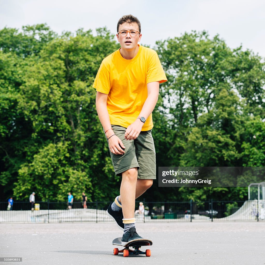 Teenage boy on a skateboard