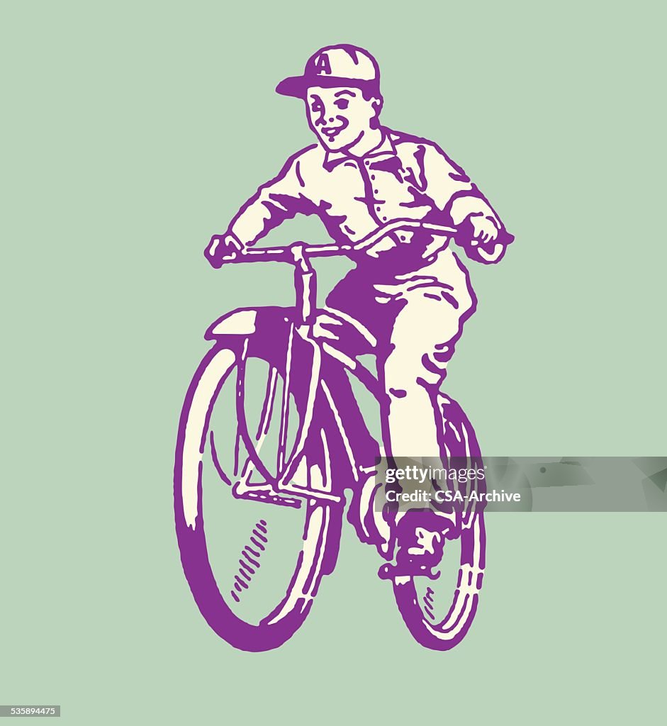 Boy Riding Bicycle