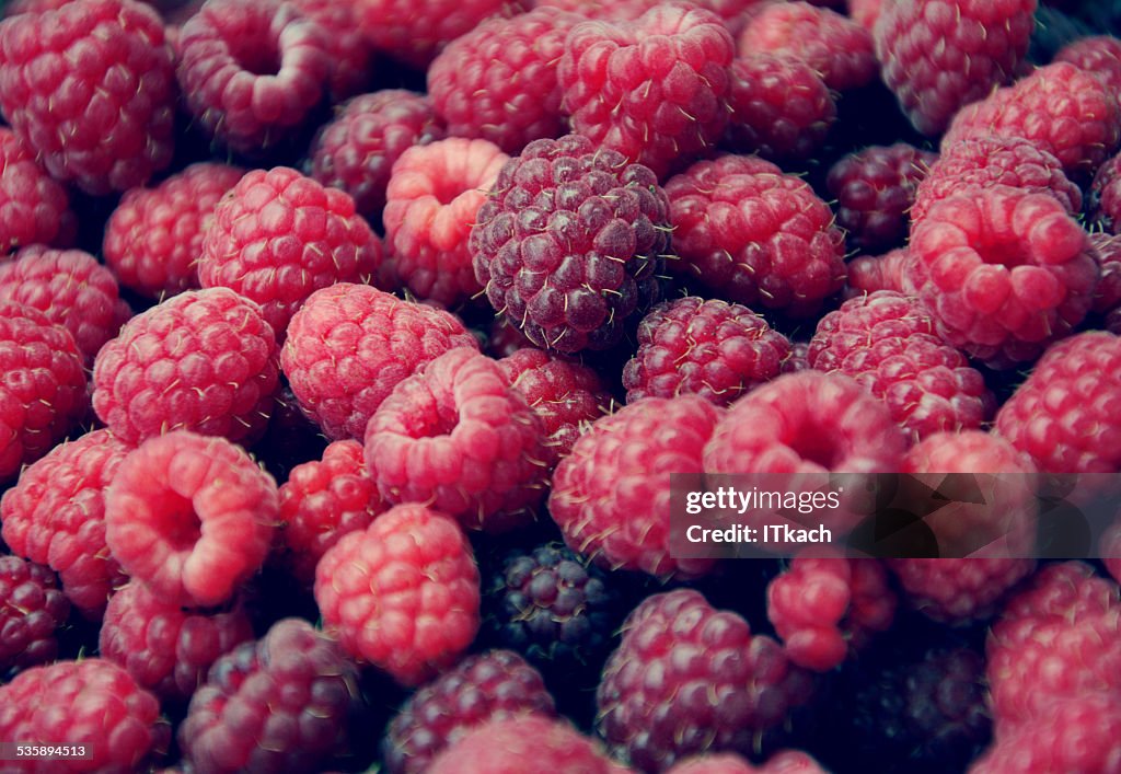 Background with sweet raspberries