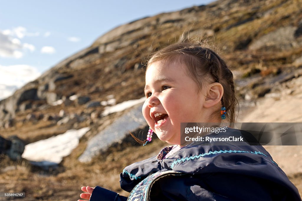 Inuit Child in the Snow, Baffin Island, Nunavut, Canada.