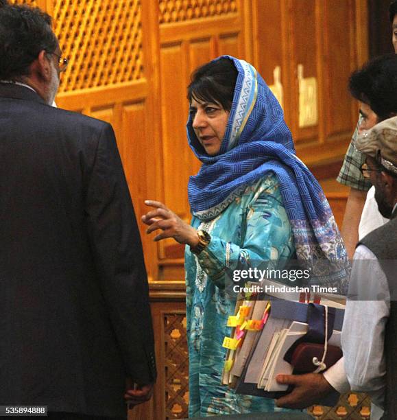 Jammu and Kashmir Chief Minister Mehbooba Mufti talking to Finance Minister Haseeb Drabu after he presents budget 2016-17, during the Budget Session...