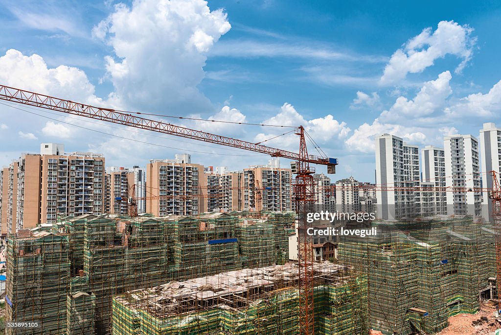 Construction site in modern city and skyline