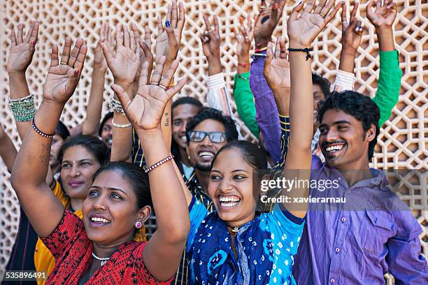 raising hands - international humanitarian aid stock pictures, royalty-free photos & images