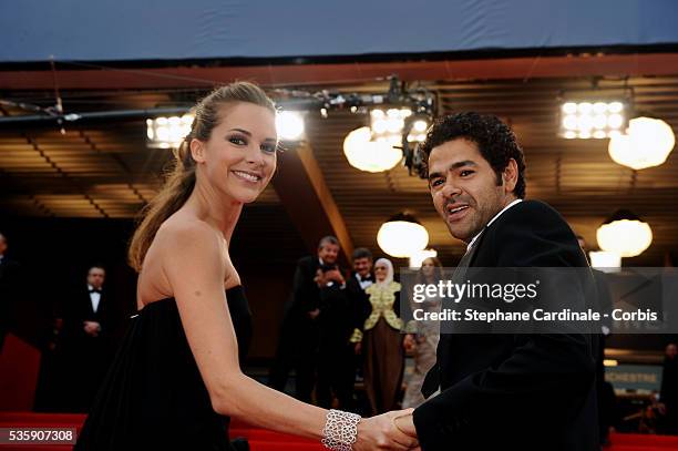 Jamel Debbouze and Melissa Theuriau attend the Premiere of 'Outside of the law' during the 63rd Cannes International Film Festival