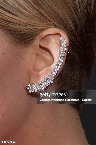 Earrings worn by Jennifer Lawrence as she attends 'The Hunger Games: Catching Fire' Paris Premiere at Le Grand Rex, in Paris.