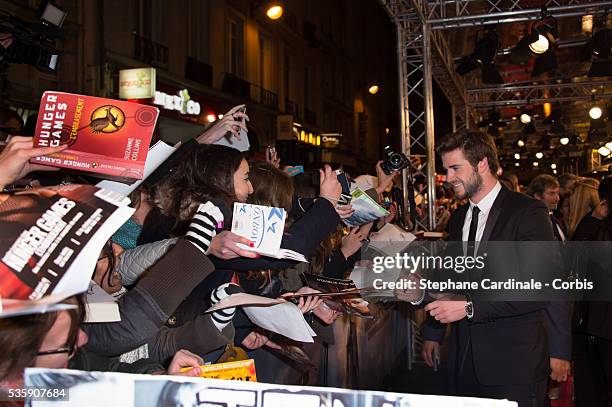 Liam Hemsworth attends 'The Hunger Games: Catching Fire' Paris Premiere at Le Grand Rex, in Paris.