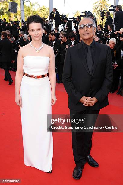 Juliette Binoche and Abbas Kiarostami attend the premiere of 'The tree' during the 63rd Cannes International Film Festival.