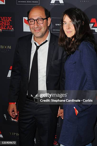 Kad Merad and Emmanuelle Cosso attend the AZ Party at VIP Room Theater in Paris.