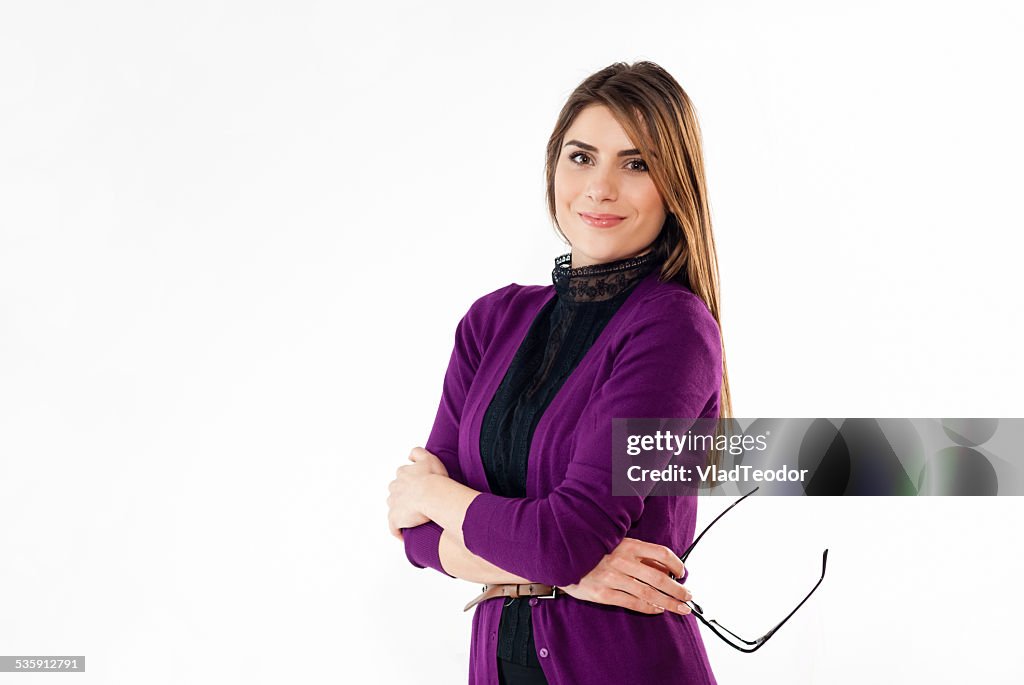 Portrait of a business woman smiling. White background.
