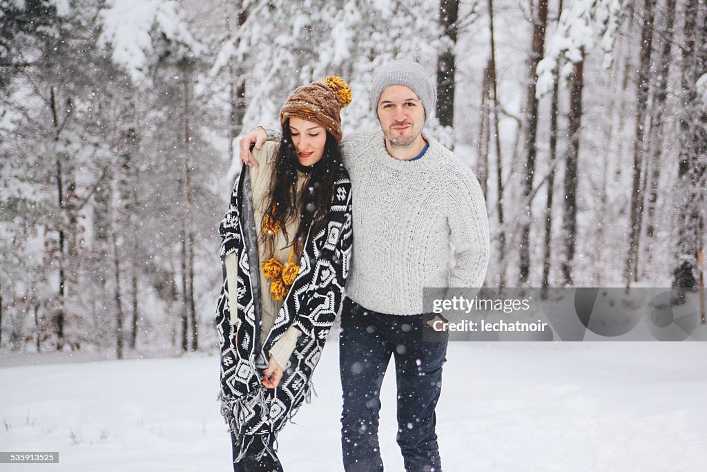 Young couple in winter nature