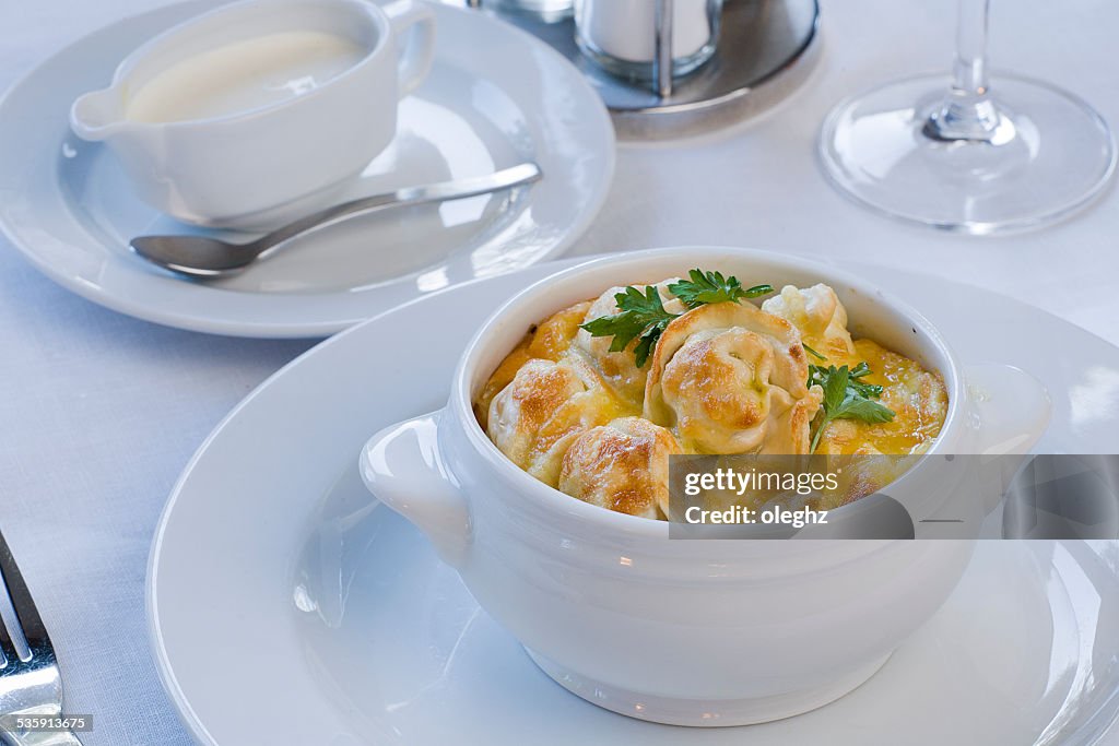 Pelmeni, meat dumplings, Dumplings in a pot