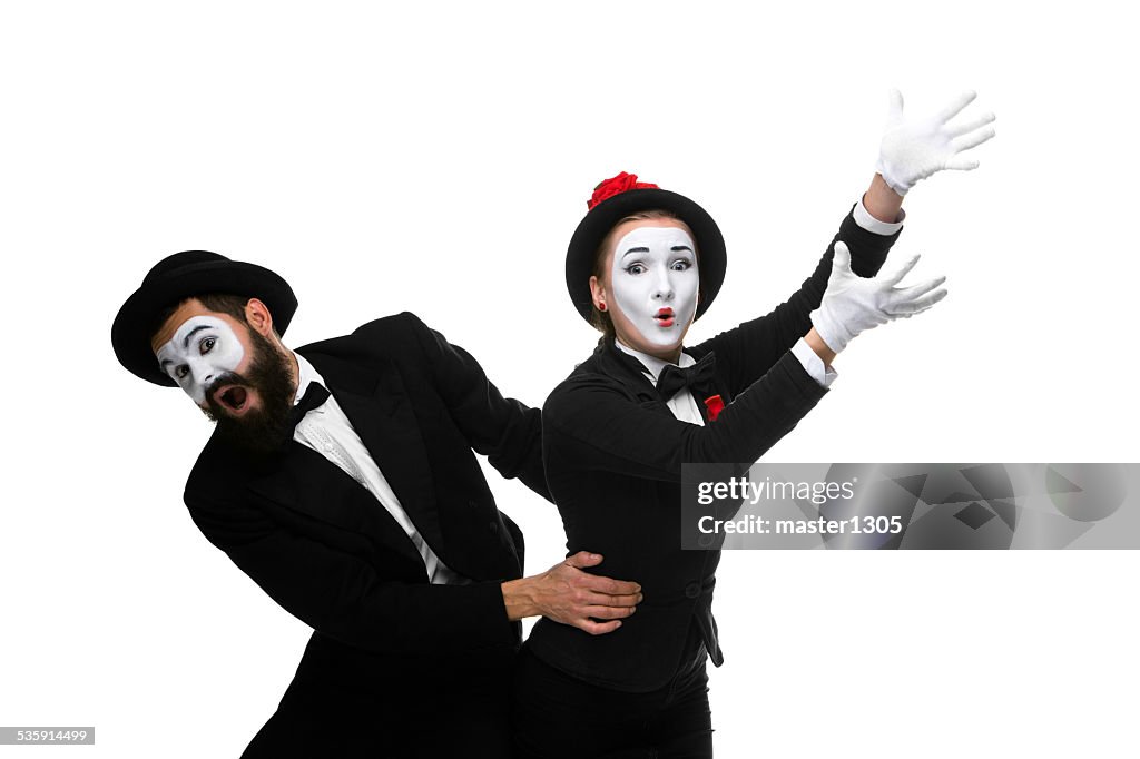 Mime holding another one up and running