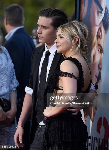 Brooklyn Beckham and actress Chloe Grace Moretz arrive at the premiere of Universal Pictures' 'Neighbors 2: Sorority Rising' on May 16, 2016 in...