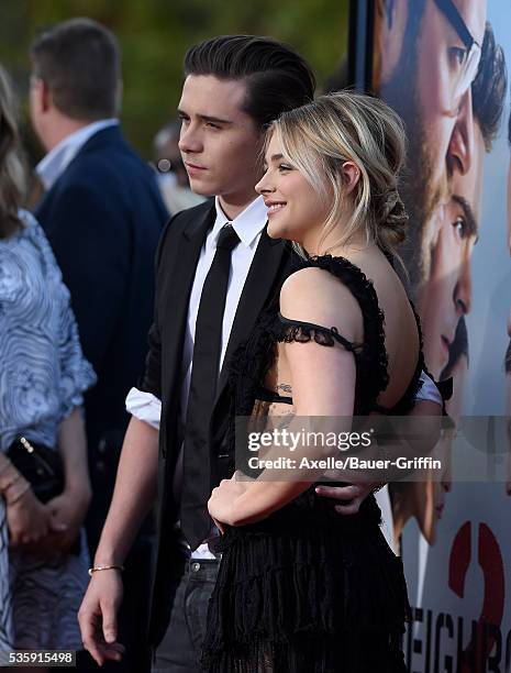 Brooklyn Beckham and actress Chloe Grace Moretz arrive at the premiere of Universal Pictures' 'Neighbors 2: Sorority Rising' on May 16, 2016 in...