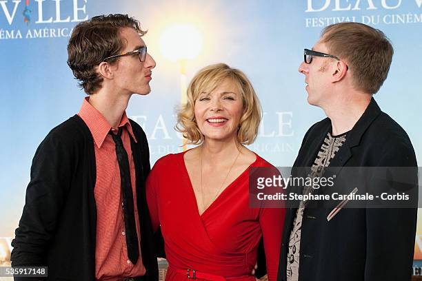 Actors Dustin Ingram, Kim Cattrall and director Keith Bearden pose during the photocall for movie "Meet Monica Velour" at the 36th American Film...