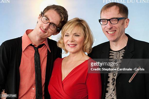 Actors Dustin Ingram, Kim Cattrall and director Keith Bearden pose during the photocall for movie "Meet Monica Velour" at the 36th American Film...