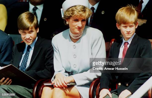 Princess Diana, Princess of Wales with her sons Prince William and Prince Harry attend the Heads of State VE Remembrance Service in Hyde Park on May...