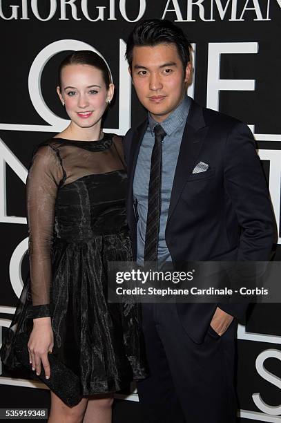 Catherine Peterson and Ray Chen attend the Giorgio Armani Prive show as part of Paris Fashion Week Haute Couture Spring/Summer 2014, at Palais de...