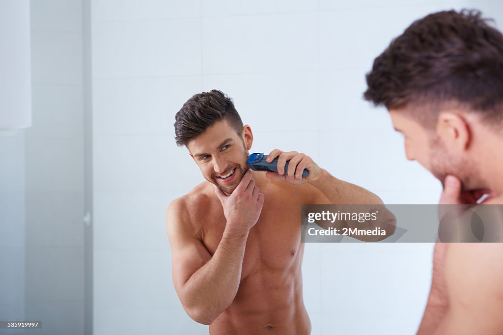 Close up portrait of young handsome man with perfect skin