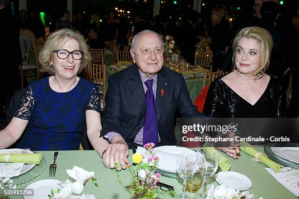 Genevieve Fioraso, Pierre Berge and Catherine Deneuve attend the Sidaction Gala Dinner at Pavillon d'Armenonville, in Paris.