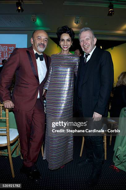 Christian Louboutin, Farida Khelfa and Jean Paul Gaultier attend the Sidaction Gala Dinner at Pavillon d'Armenonville, in Paris.