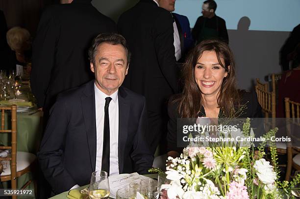 Michel Denisot and Doria Tillier attend the Sidaction Gala Dinner at Pavillon d'Armenonville, in Paris.