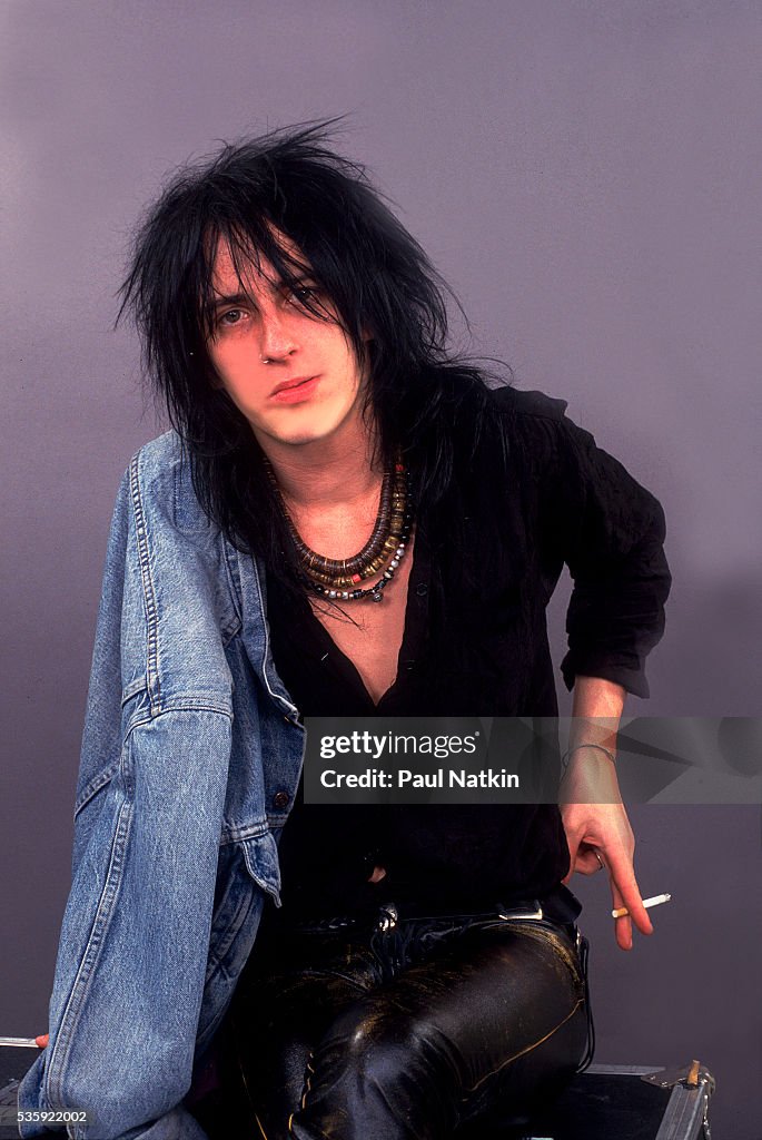 Izzy Stradlin of Guns And Roses (Duff McCagan, Slash, Axl Rose, Izzy Stradlin, Steven Adler) at the UIC Pavillion  in Chicago, Illinois