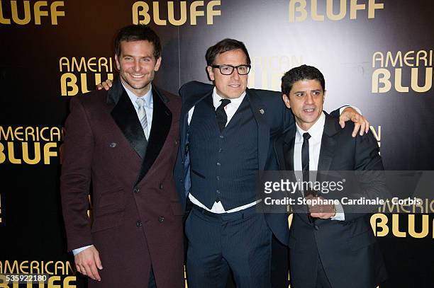 Actor Bradley Cooper, director David O. Russell and actor Said Taghmaoui attend the 'American Bluff' Paris Premiere at Cinema UGC Normandie, in Paris.