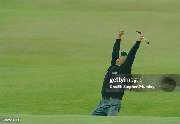 Costantino Rocca of Italy celebrates his birdie putt on the 18th green to force a playoff with John Daly on 23 July 1995 during the Open Championship...