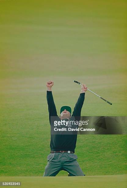 Costantino Rocca of Italy celebrates his birdie putt on the 18th green to force a playoff with John Daly on 23 July 1995 during the Open Championship...
