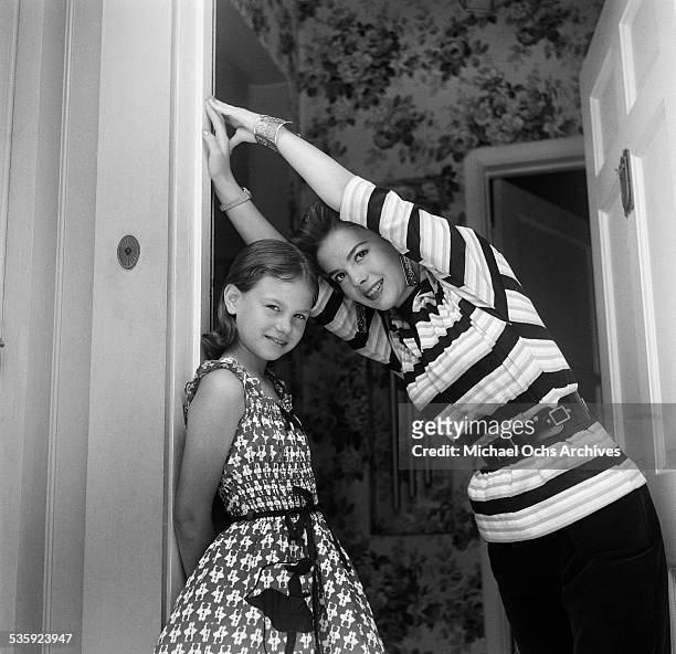 Actress Natalie Wood and her sister Lana Wood pose for a portrait at home in Los Angeles,CA.
