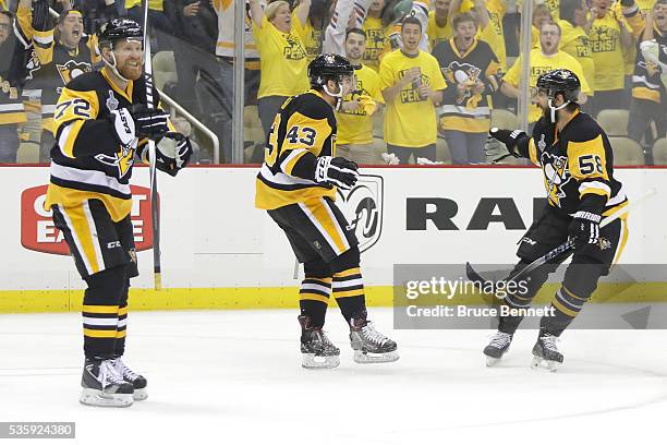 Conor Sheary of the Pittsburgh Penguins celebrates with Kris Letang after scoring a first period goal against the San Jose Sharks in Game One of the...