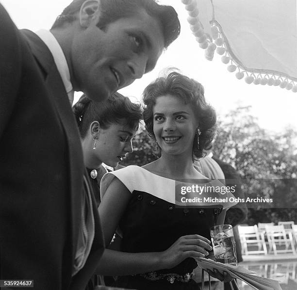 Actress Natalie Wood and Hugh O'Brian attend the Jimmy McHugh Party in Los Angeles,CA.