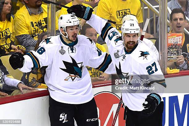 Tomas Hertl of the San Jose Sharks celebrates with Joonas Donskoi after scoring a second period goal against Matt Murray of the Pittsburgh Penguins...