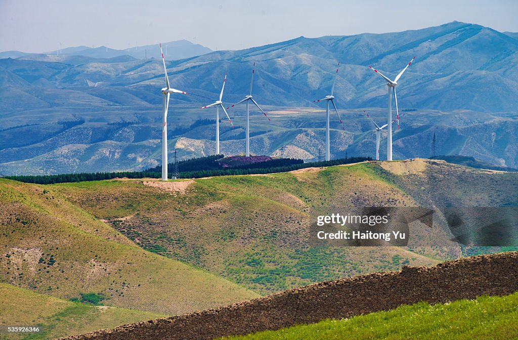 Wind turbines over the Great Wall of China