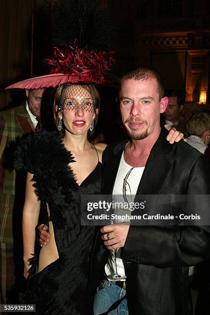 Video artist Sam Taylor-Wood and fashion designer Alexander McQueen at the Moet & Chandon fashion tribute to designer Philip Treacy.