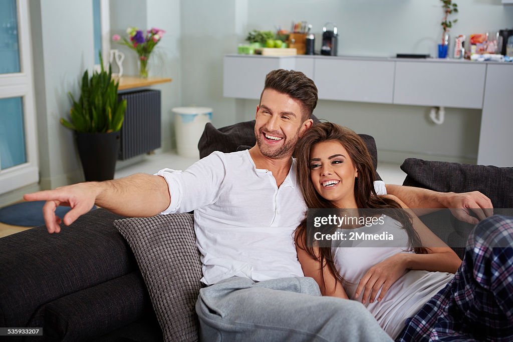 Couple relaxing on a sofa