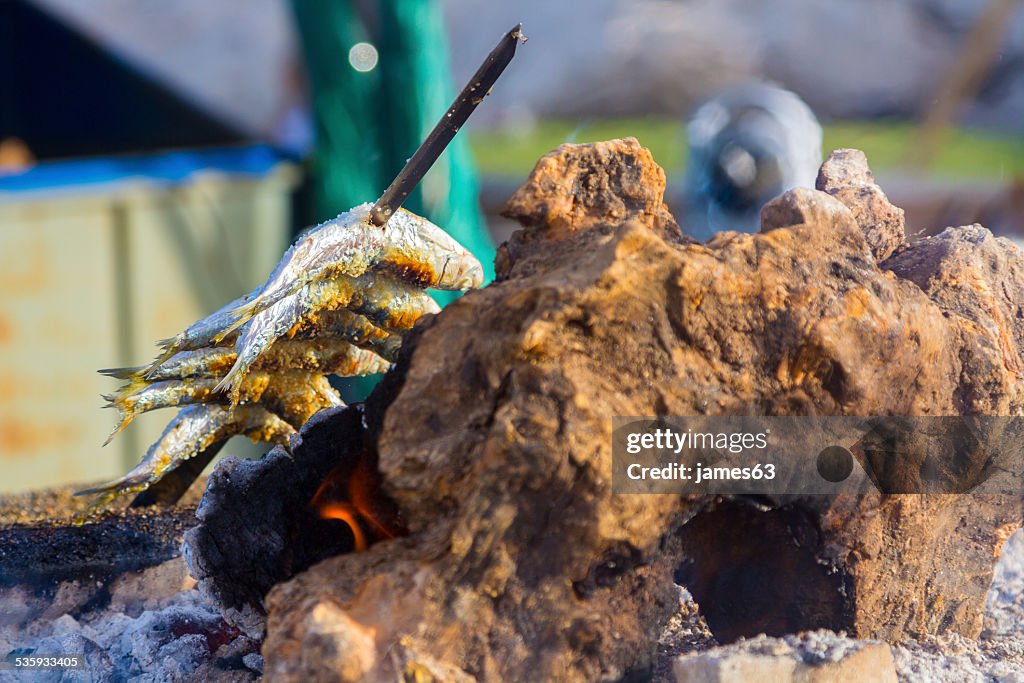 Delicious grilled sardines on typical coals of the Sunshine Coas