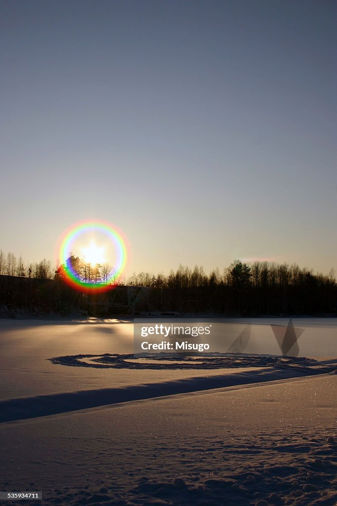 Setting wintery sun in Finland