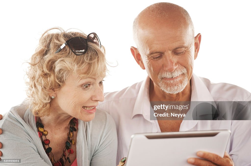 Happy couple with tablet