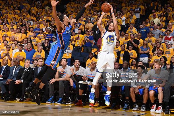 Stephen Curry of the Golden State Warriors shoots against the Oklahoma City Thunder during Game Seven of the Western Conference Finals during the...